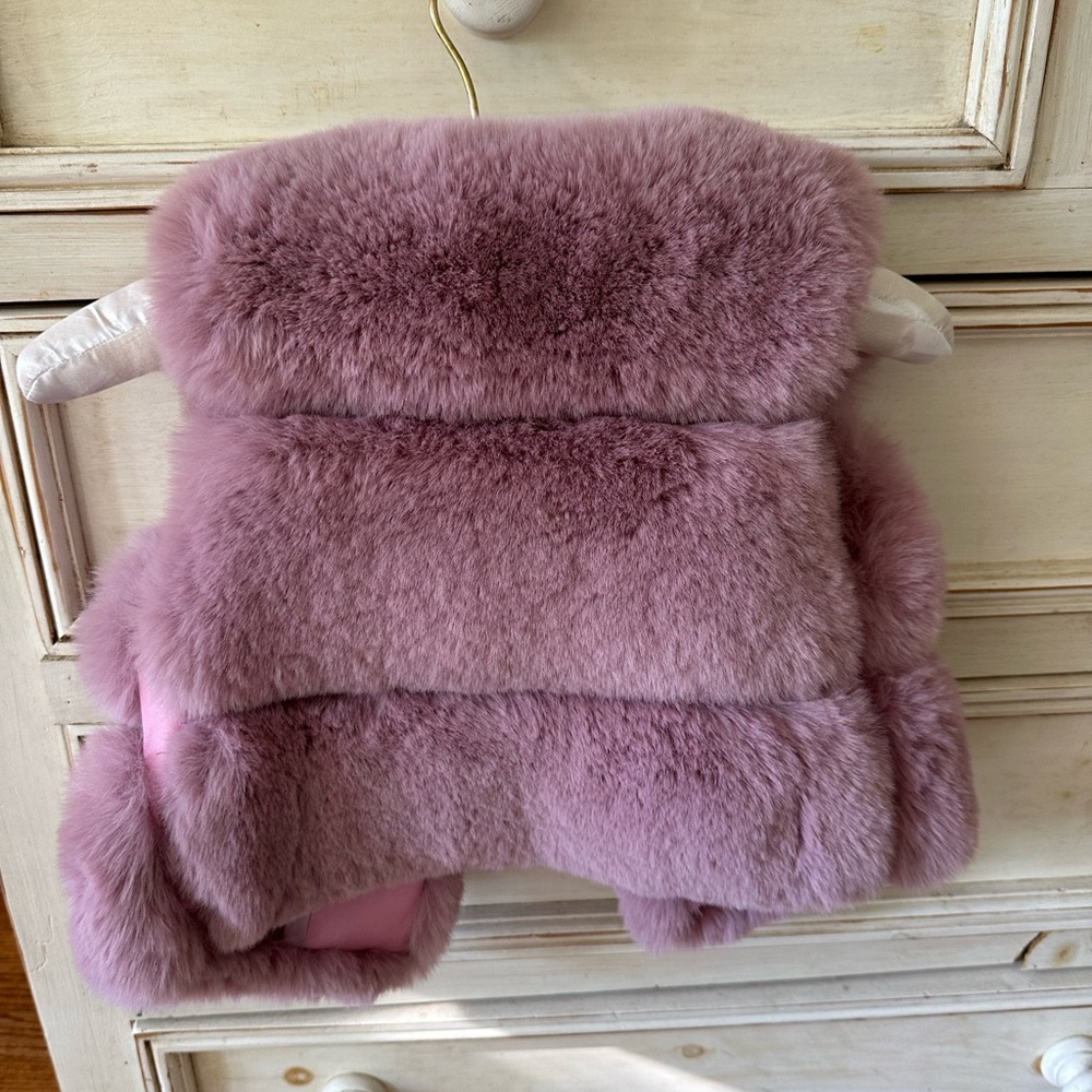 Girls faux fur lavender vest. NWT. Size 6
